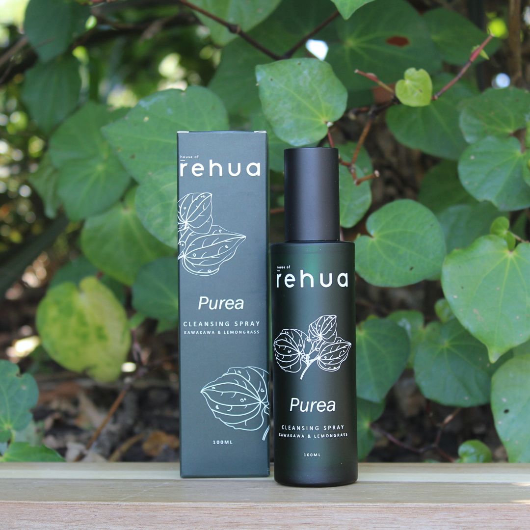 Rehua Purea cleansing spray bottle and packaging against a green leafy background