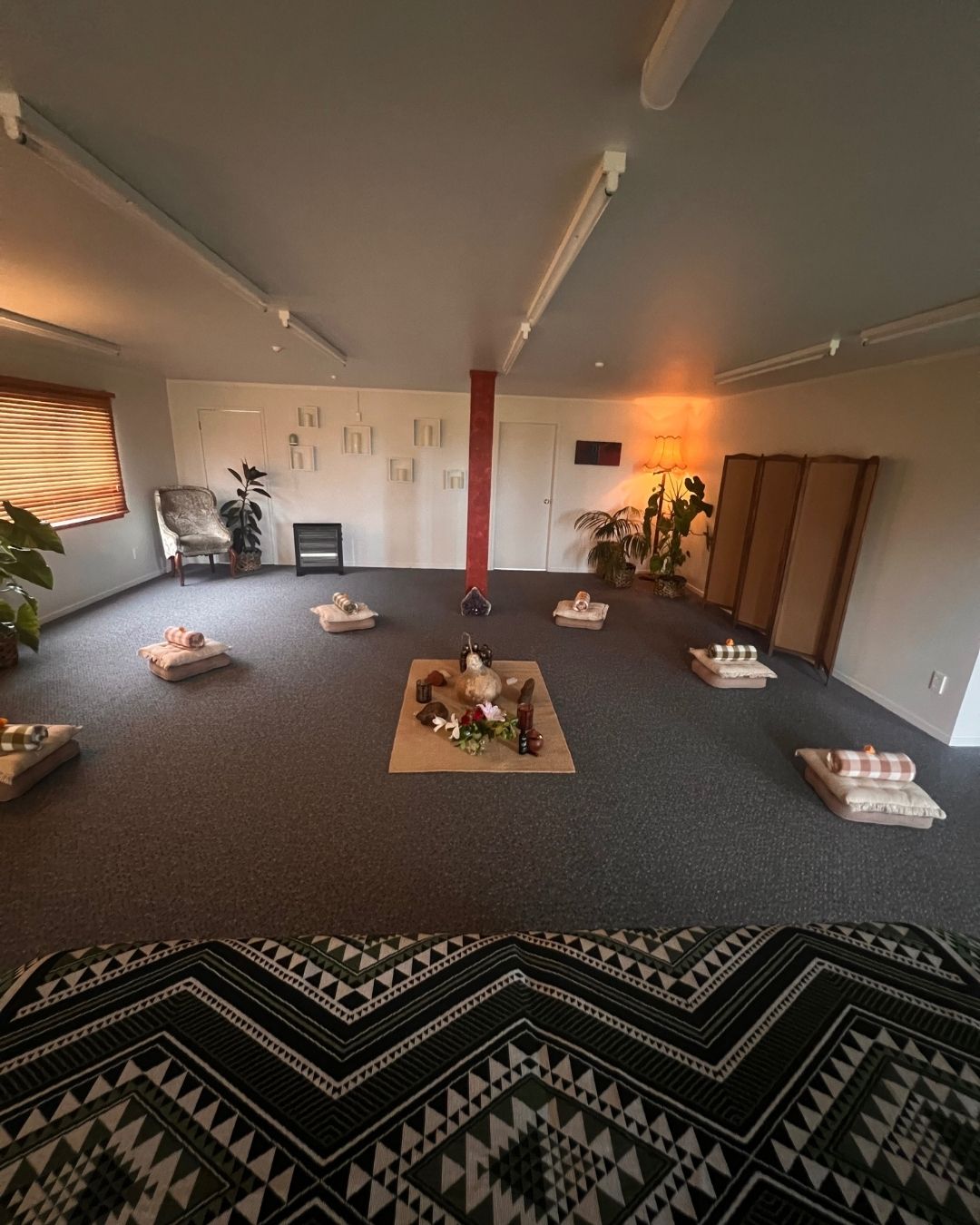 Yoga studio with mats and props on the floor