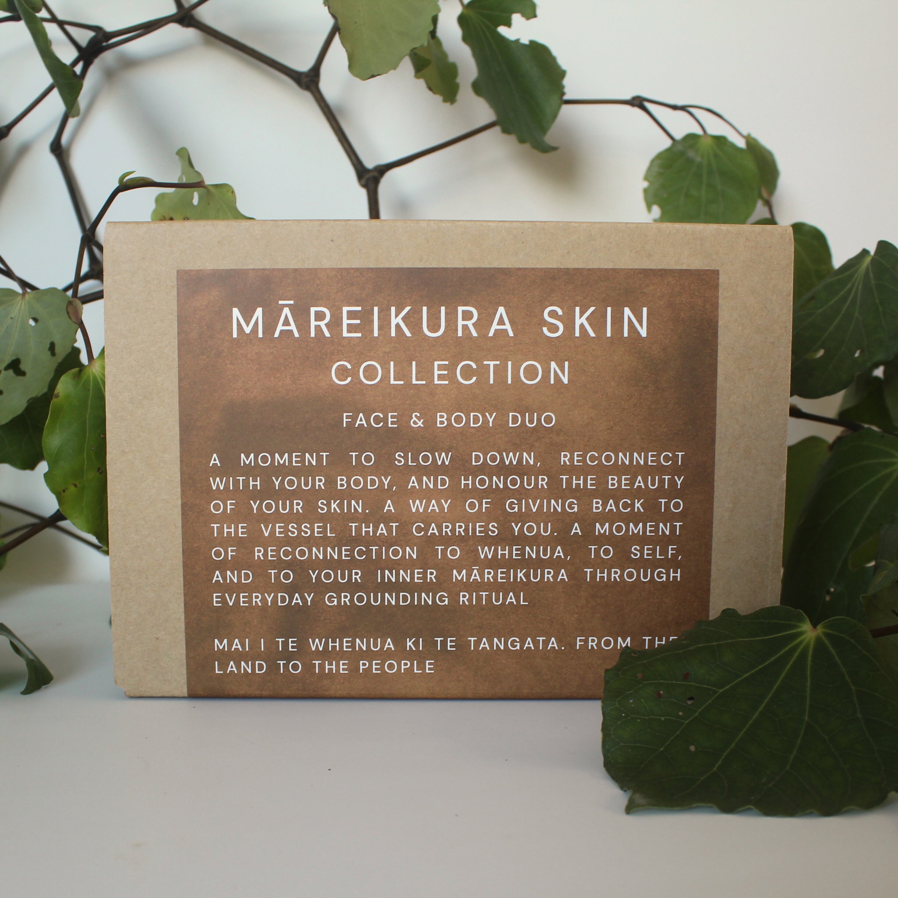 Märeikura Skin Collection packaging with text on a white background with green leaves.